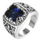 Bague Biker Dark Crown argent 925, zircone bleue intense carrée, motifs gothiques sculptés.