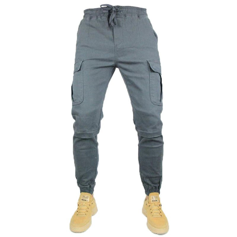Jogging Moto Urban Rider gris homme, coupe fuselée, poches cargo, protections intégrées.