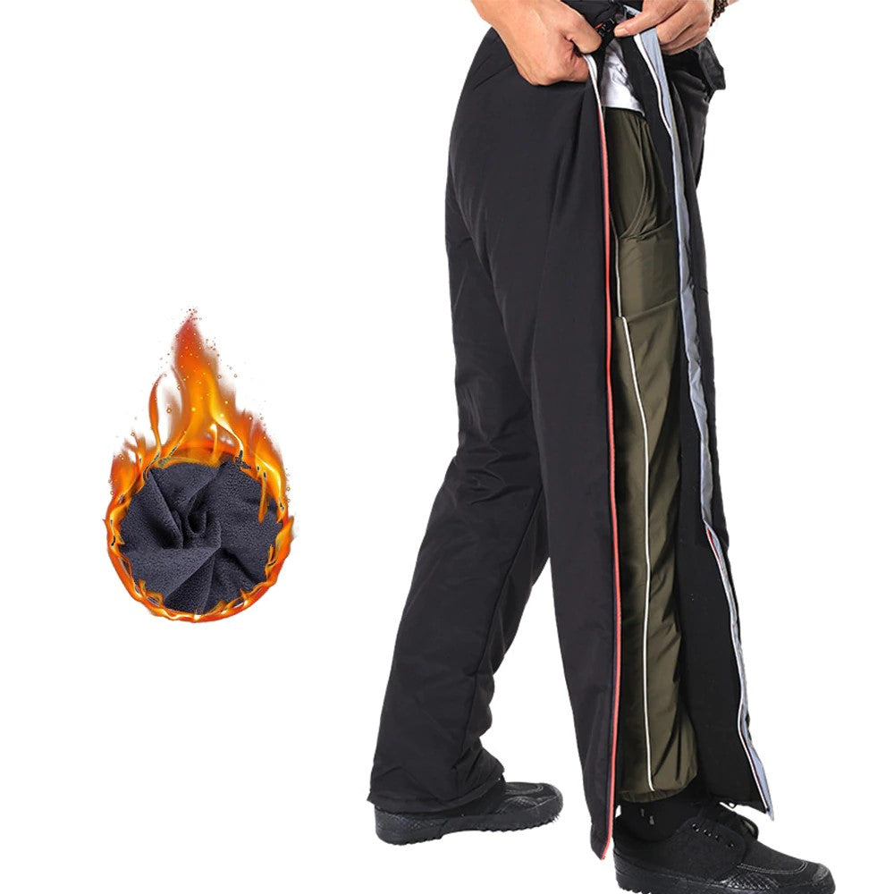 Surpantalon moto hiver coupe-vent et chaud avec zips latéraux et bandes réfléchissantes.
