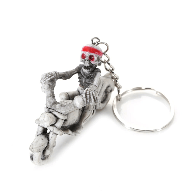 porte-clé motard squelette en caoutchouc avec moto et bandana rouge – style biker original